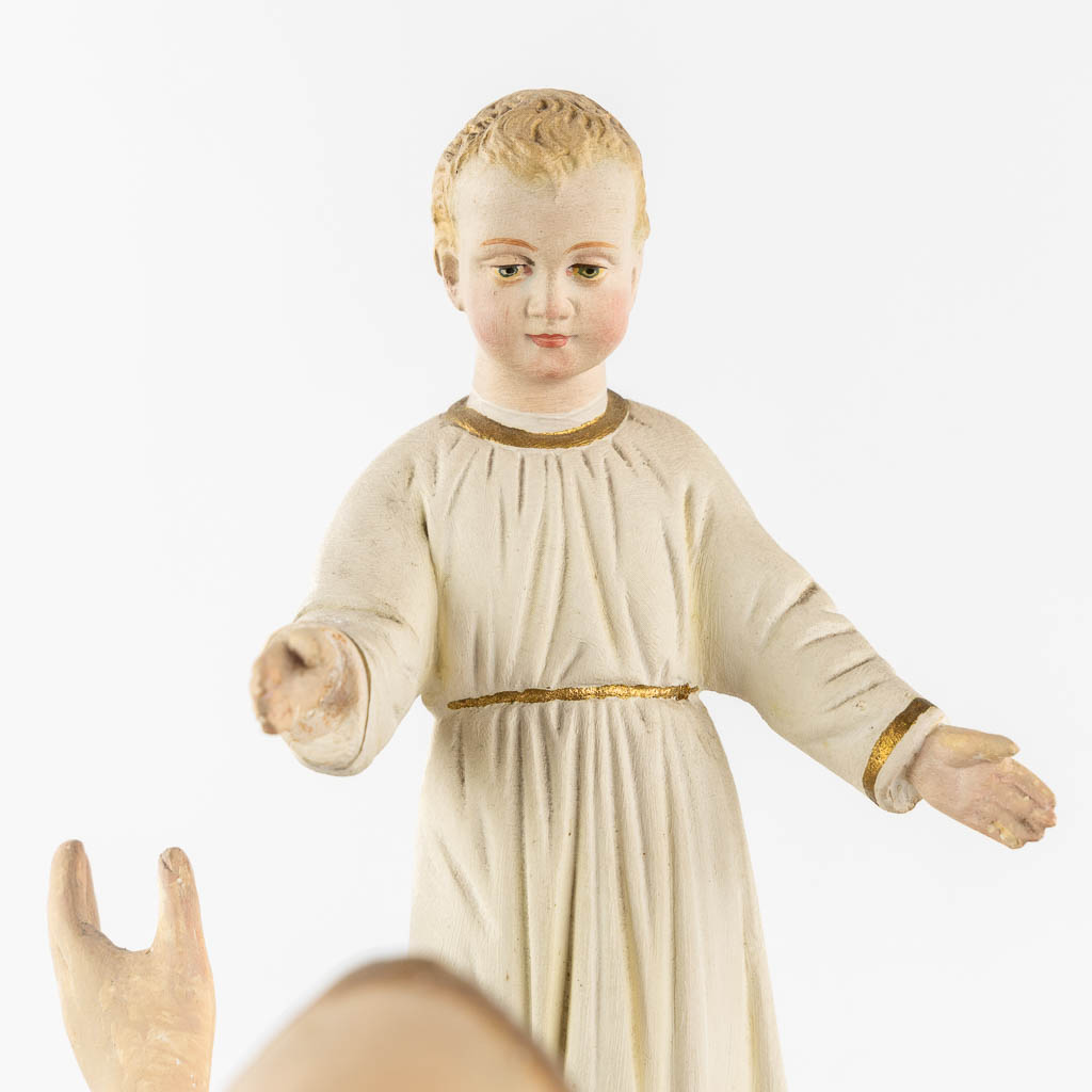 Saint Anthony with a child, polychrome plaster. Circa 1900. (L:20 x W:32 x H:44 cm)