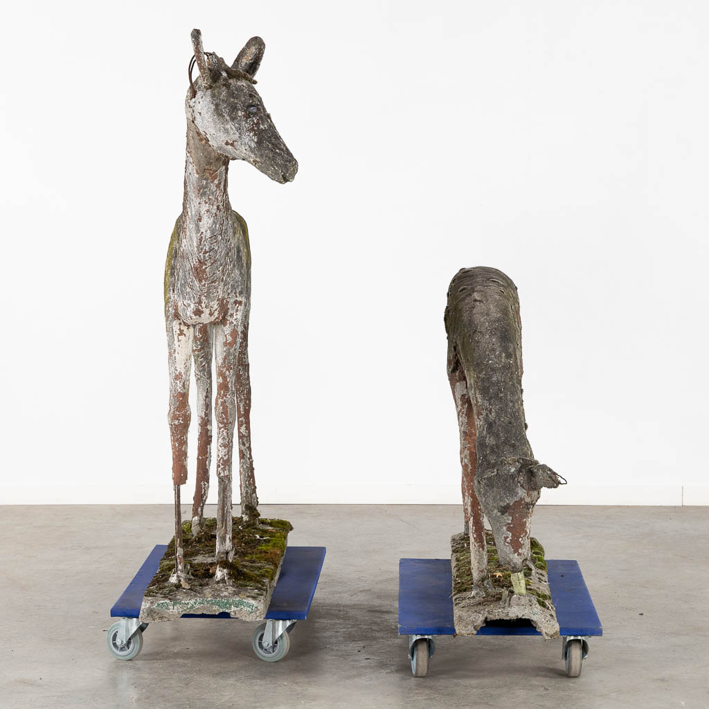 An exceptional and decorative pair of deer, concrete, circa 1920. (L:40 x W:130 x H:140 cm)