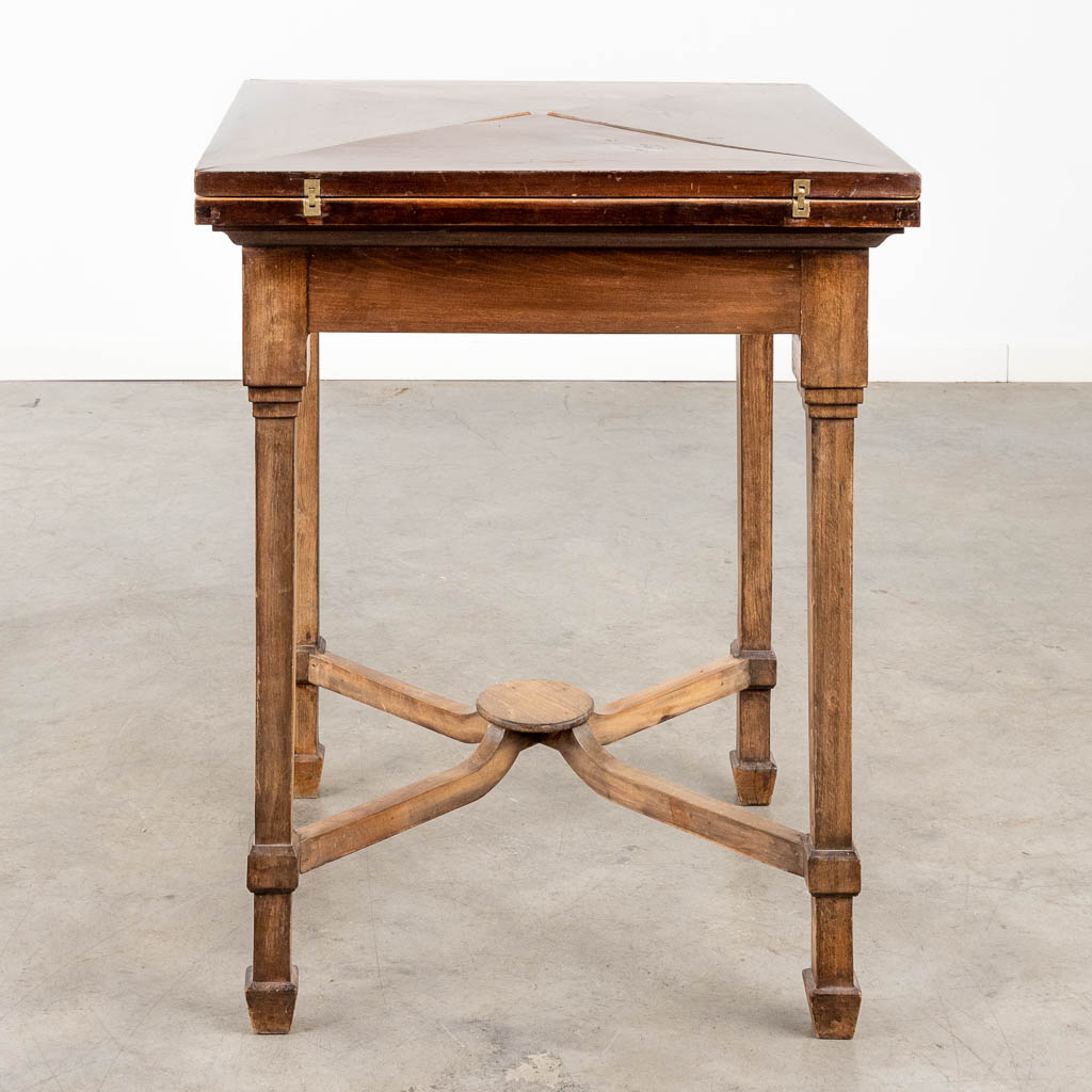 An antique game table with folding top. 19th C. (L:84 x W:84 x H:77 cm)