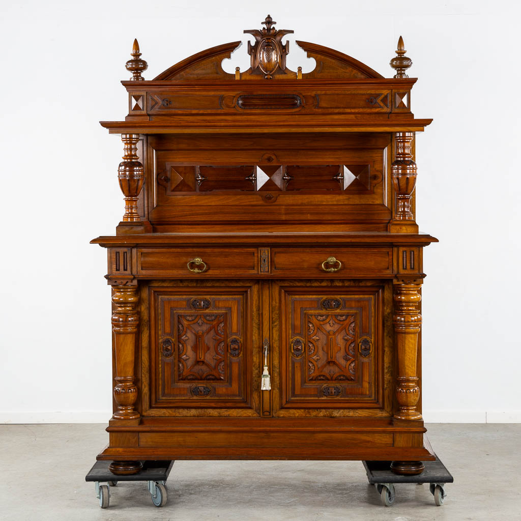 Arthur Etienne & Soeur, Bruxelles, a walnut dresser, Henry Deux. 19th C. (L:61 x W:150 x H:208 cm)