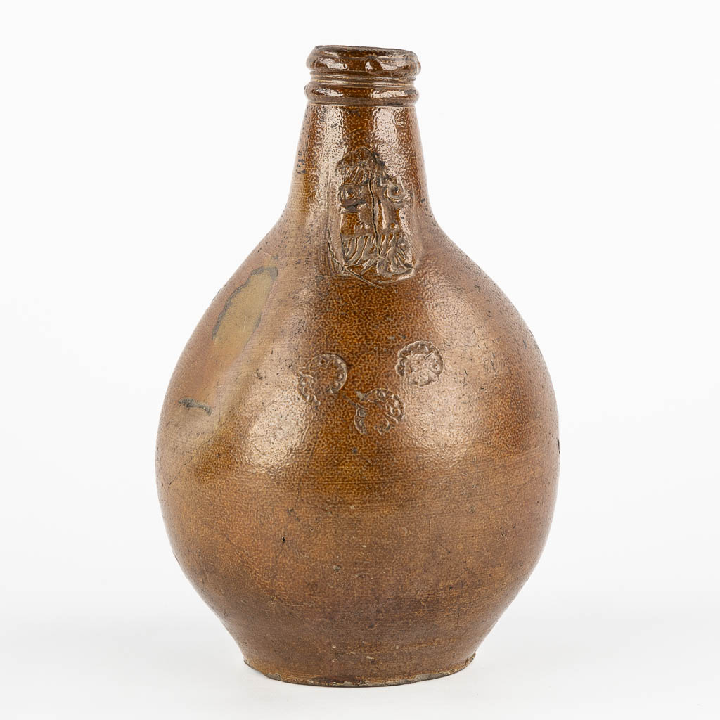 An antique Bartmann jug with three stamps, 17th C. (H:27 x D:17 cm)