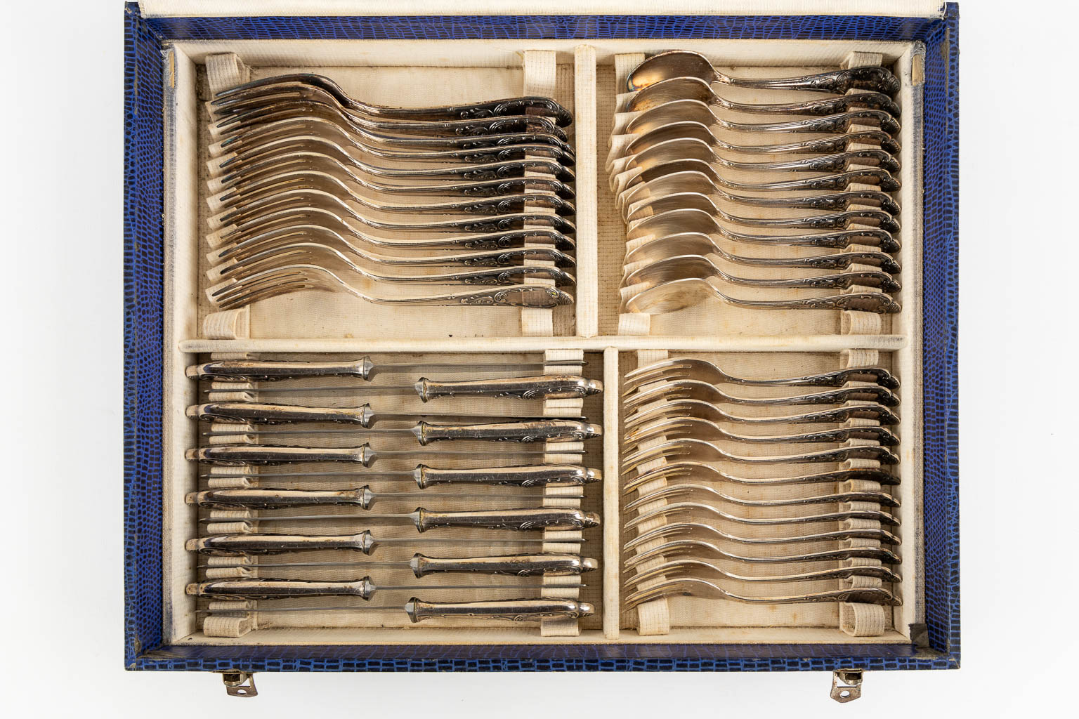 A 84-piece silver-plated cutlery in Louis XV style. (L:33 x W:40 x H:10 cm)