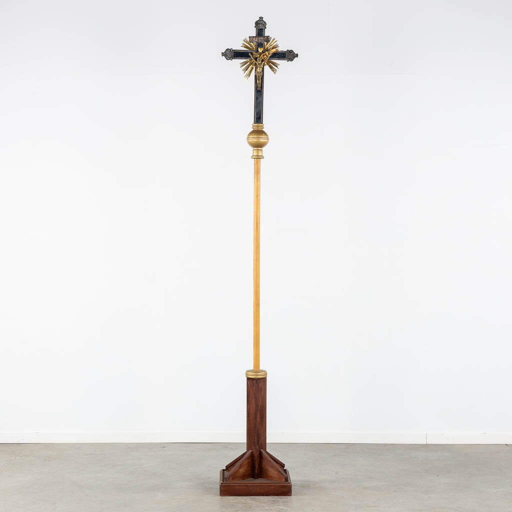 Four Processional crucifixes with their stands. Silver-plated metal and Brass. (H:265 cm)