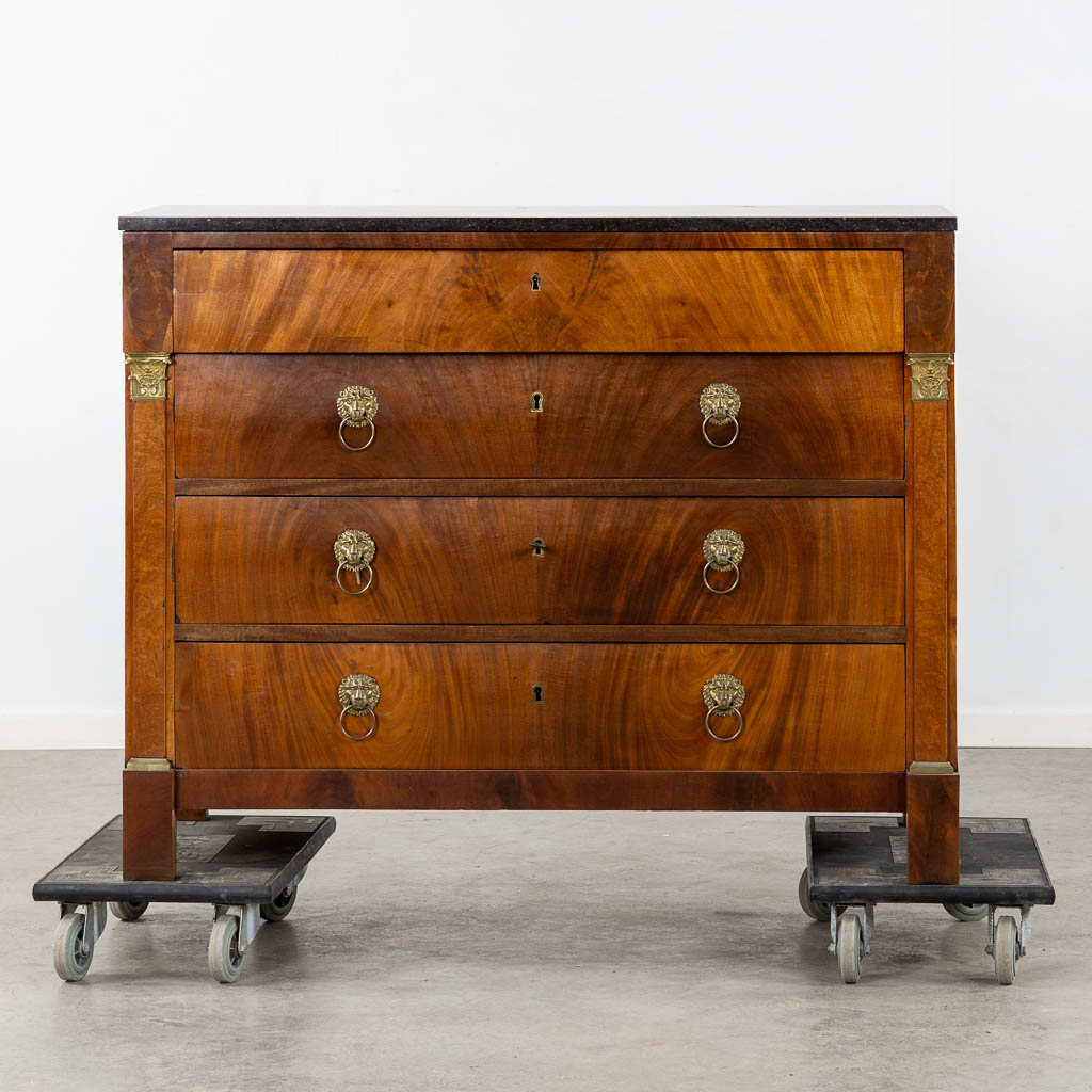 A four-drawer commode mounted with gilt bronze and a marble top, Empire. (L:53 x W:125 x H:98 cm)