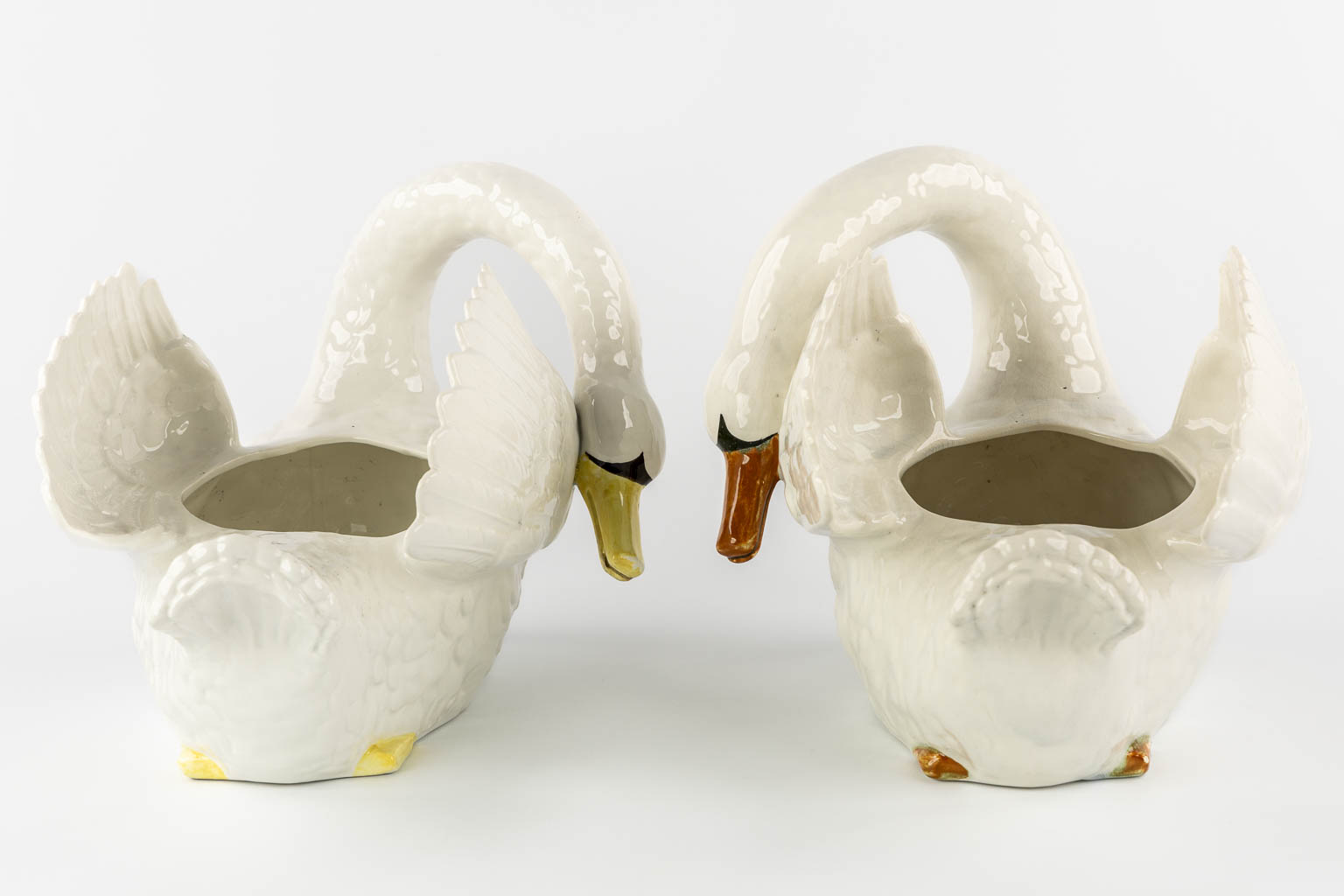 Nimy, a pair of figurative cache-pots, Swans.