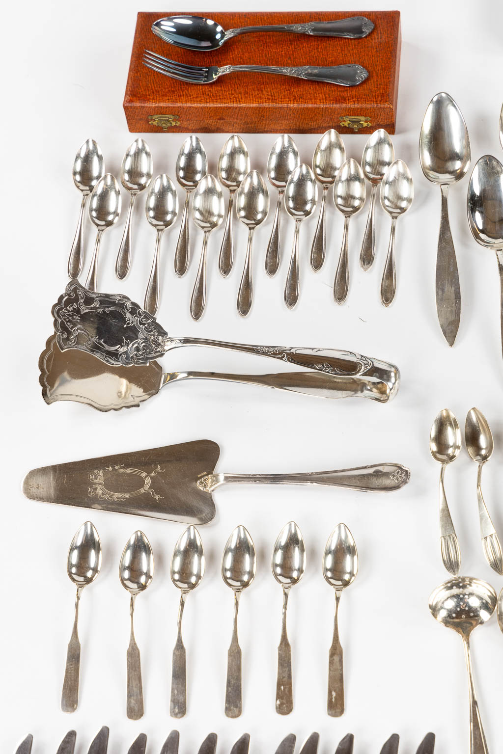 A large collection of silver and silver-plated cutlery. 