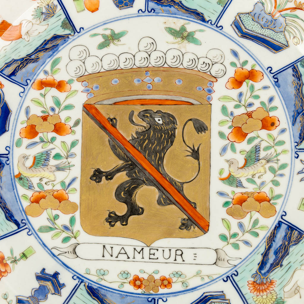 A Chinese Famille Verte Armorial 'Provinces' plate, 19th/20th C.