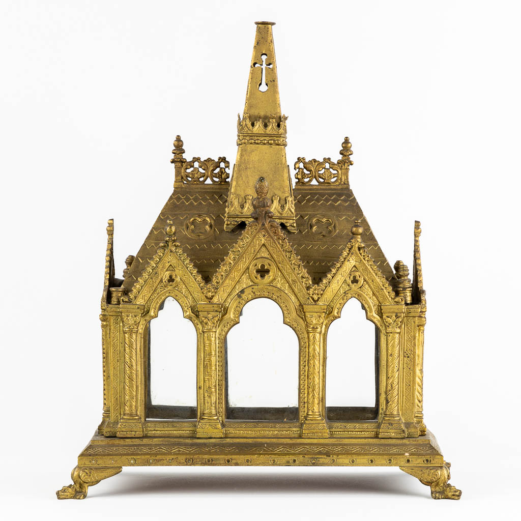 A Reliquary Shrine shaped like a Gothic Revival chapel, gilt bronze.