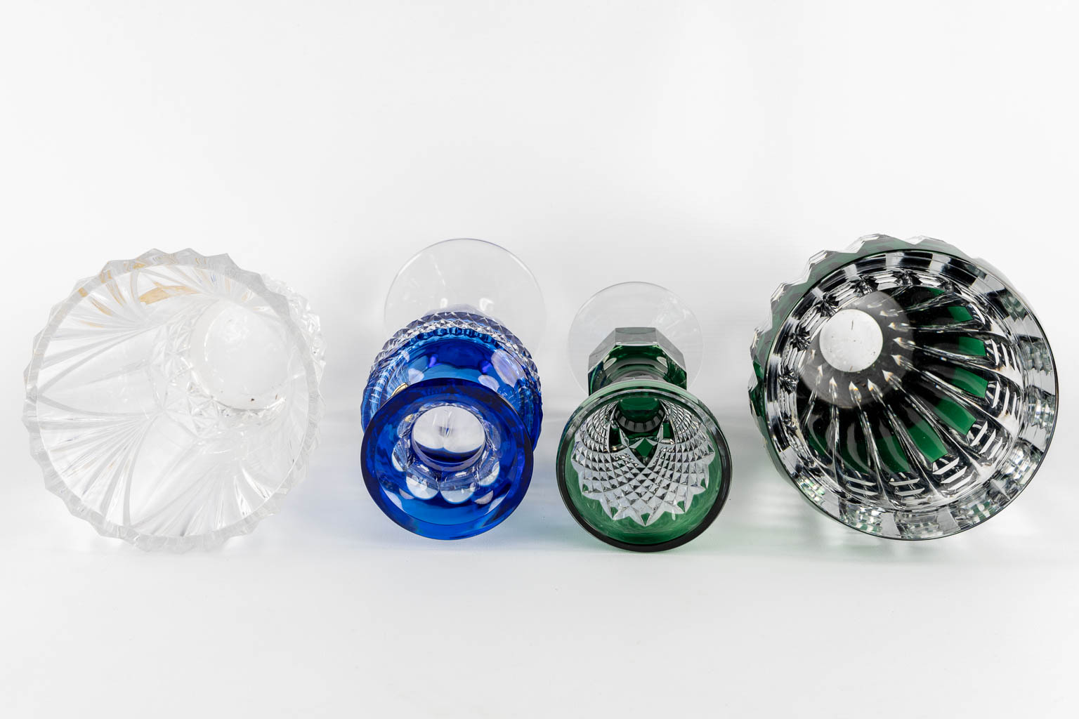 Val Saint Lambert, eight cut and coloured crystal vases. 