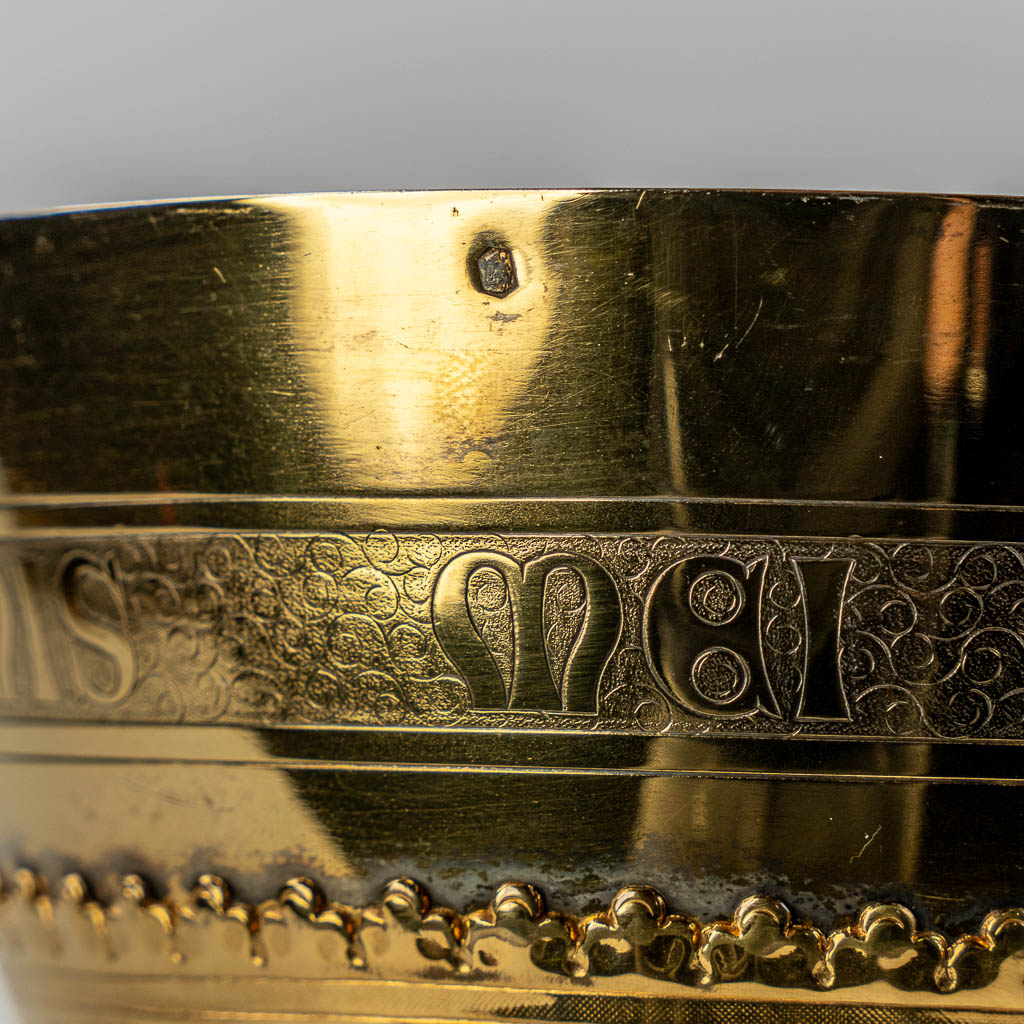 A Gothic Revival chalice with enamel plaques, cabochons. Silver Cuppa, Gilt brass, 19th C.