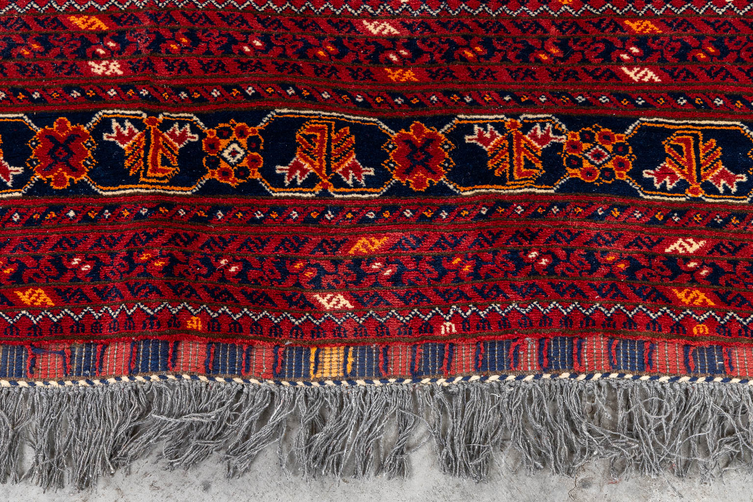 An Oriental hand-made carpet, Afghan. (L:290 x W:193 cm)