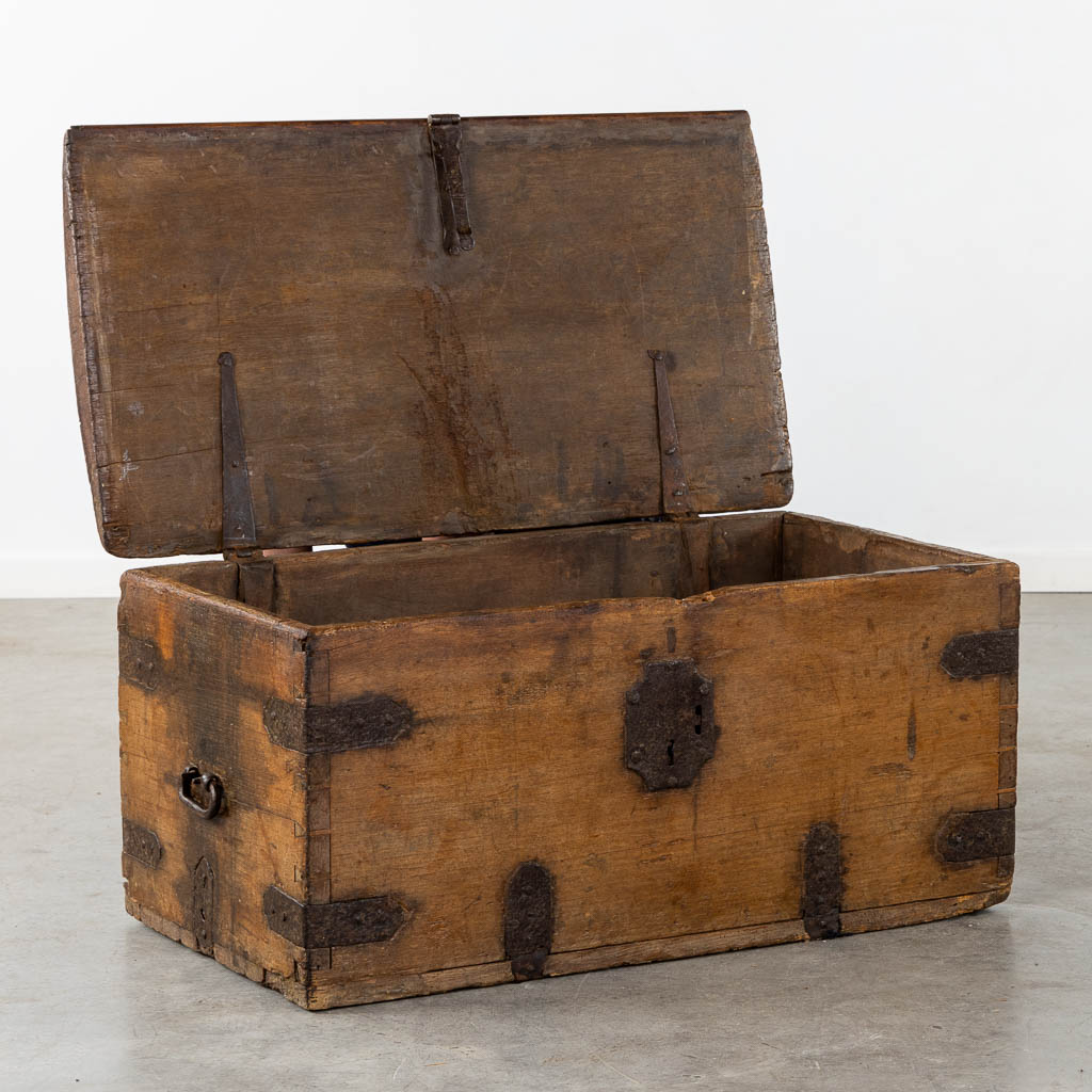 An antique chest with wrought iron hardware, circa 1700. (L:52 x W:93 x H:48 cm)