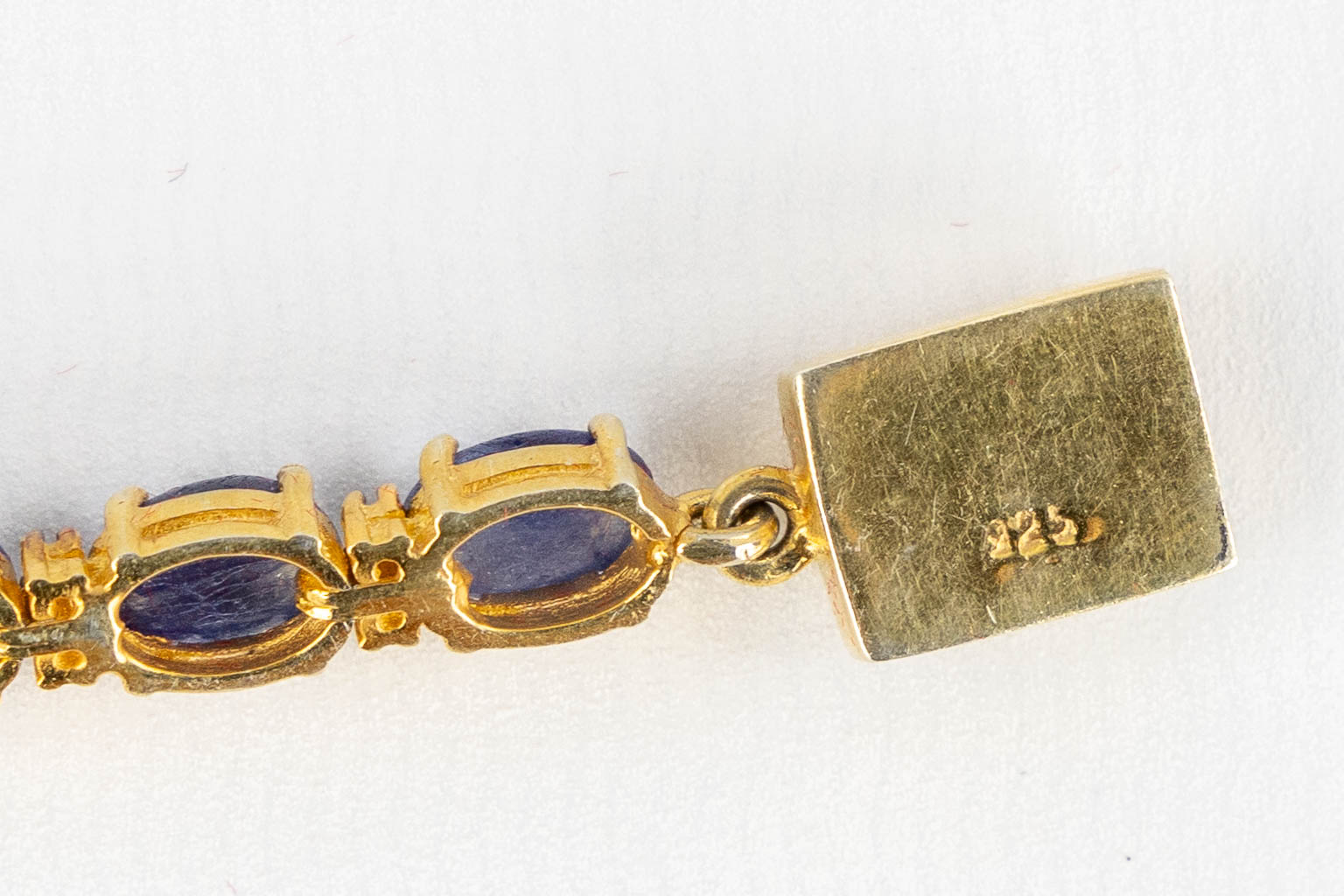 A bracelet, gilt silver with cabochon Sapphires and old cut diamonds. 23,35g. 