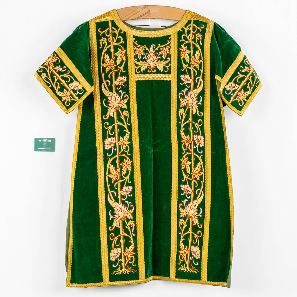 A set of Dalmatics and a Roman Chasuble, added a Chasuble and stola, maniple. Embroideries. Made around 1910.  Church use.