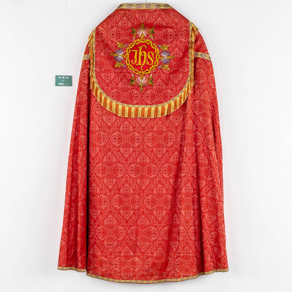 A Cope, a pair of Dalmatics and Two Roman Chasubles, Embroideries.