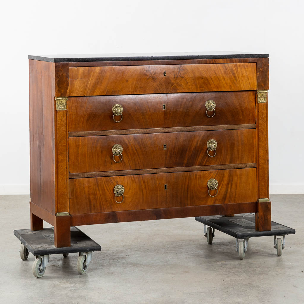 A four-drawer commode mounted with gilt bronze and a marble top, Empire. (L:53 x W:125 x H:98 cm)