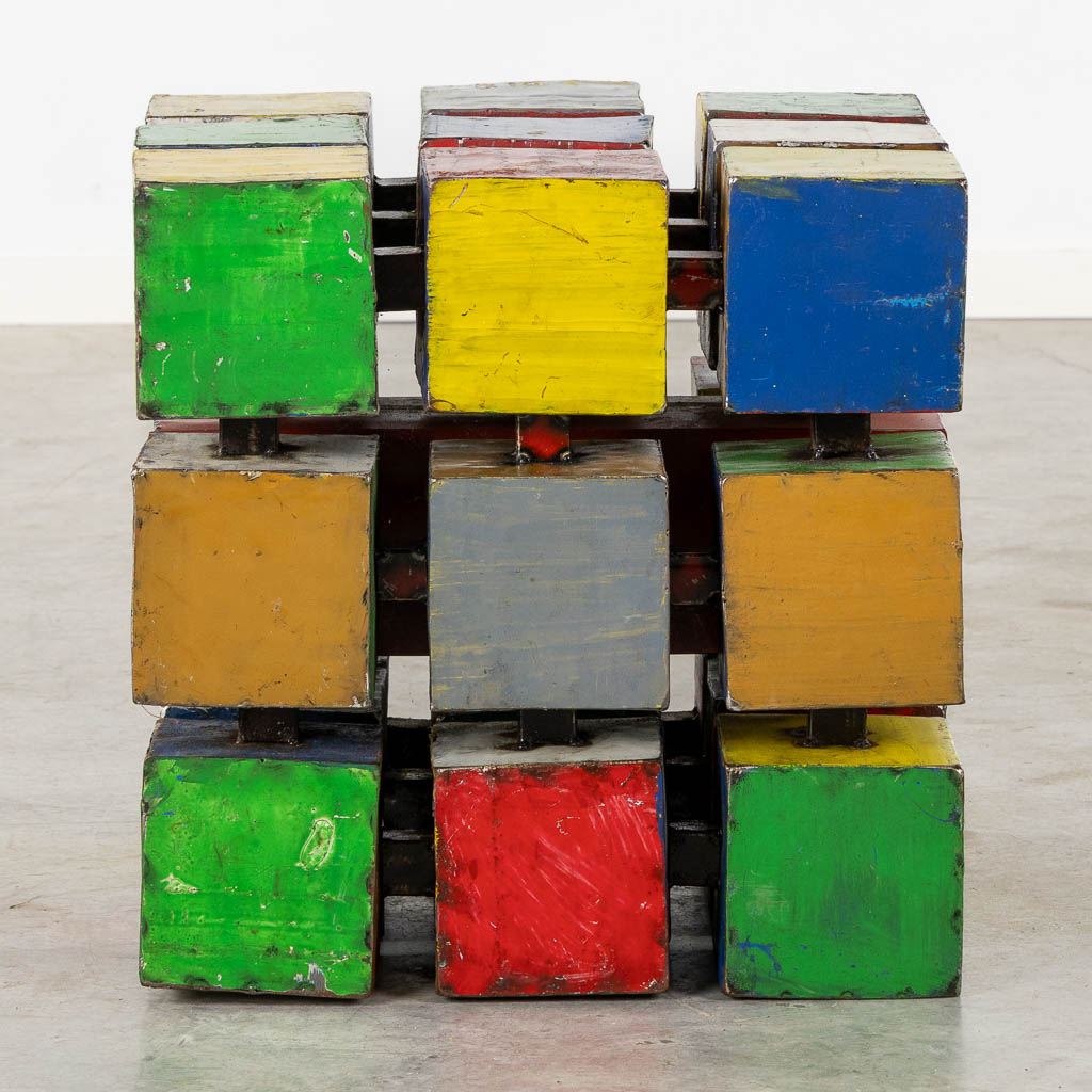 A mid-century side table in the shape of a Rubik's Cube 