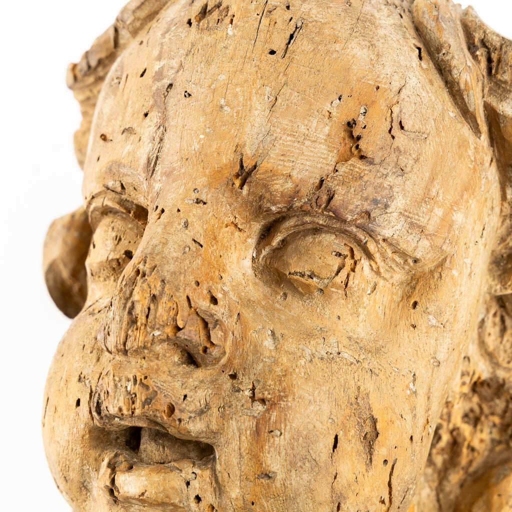 Head of an angel, an antique wood sculpture. 18th C. (L:18 x W:20 x H:30 cm)