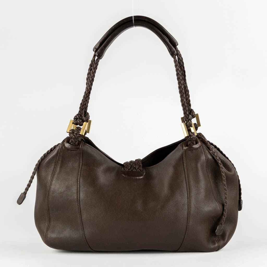 Delvaux Eugène PM, a brown leather handbag. (W:38 x H:26 cm)