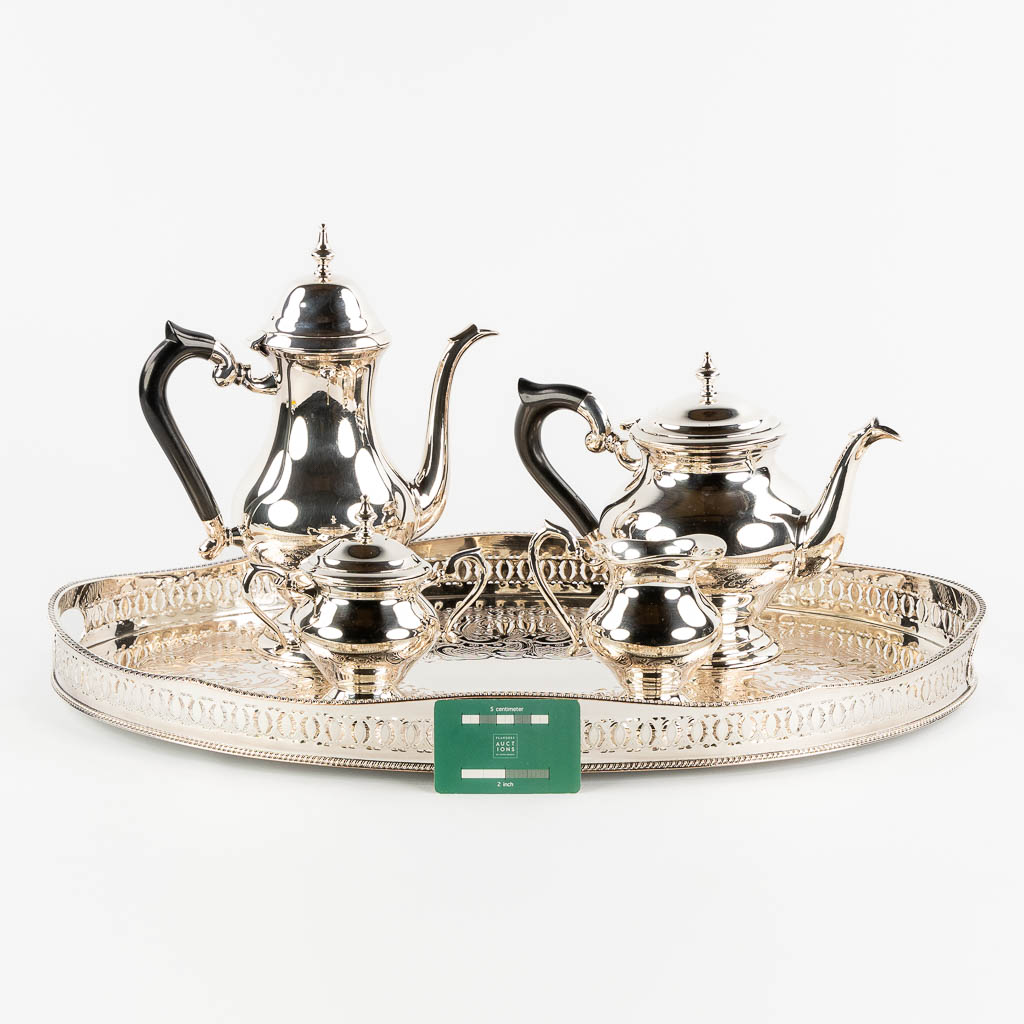 A silver-plated coffee and tea service on a platter. (L:41 x W:61 cm)