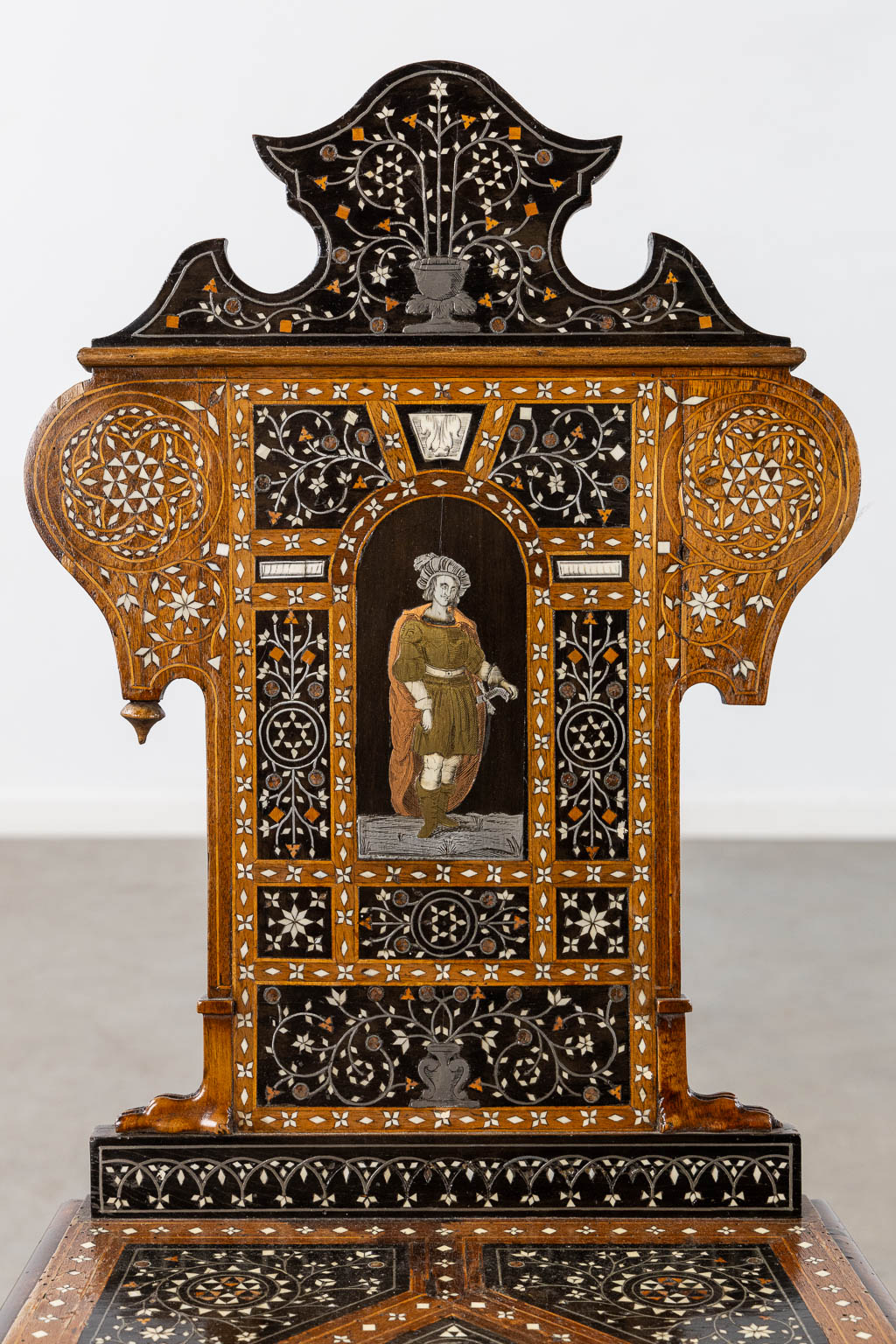 A Syrian table with two matching chairs, Marquetry and copper inlay, 19th C. (L:87 x W:121 x H:80 cm)