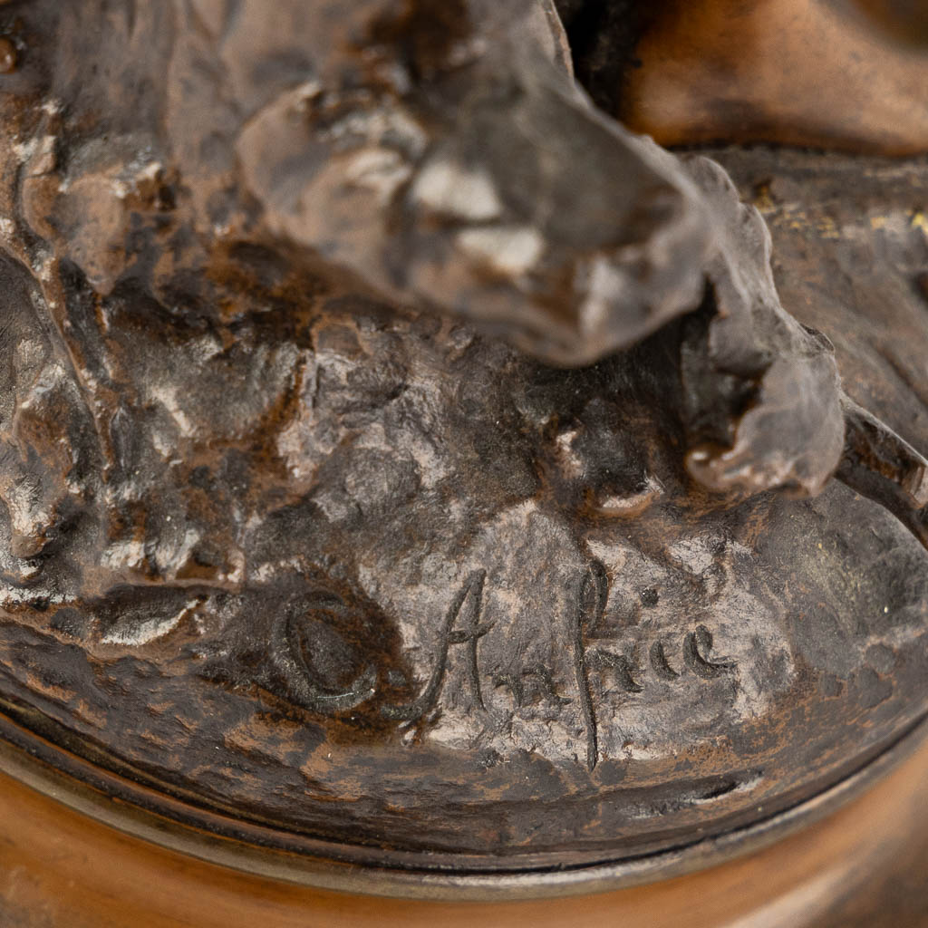 Two patinated bronze figurines of a Lady and Smoker, Circa 1900.