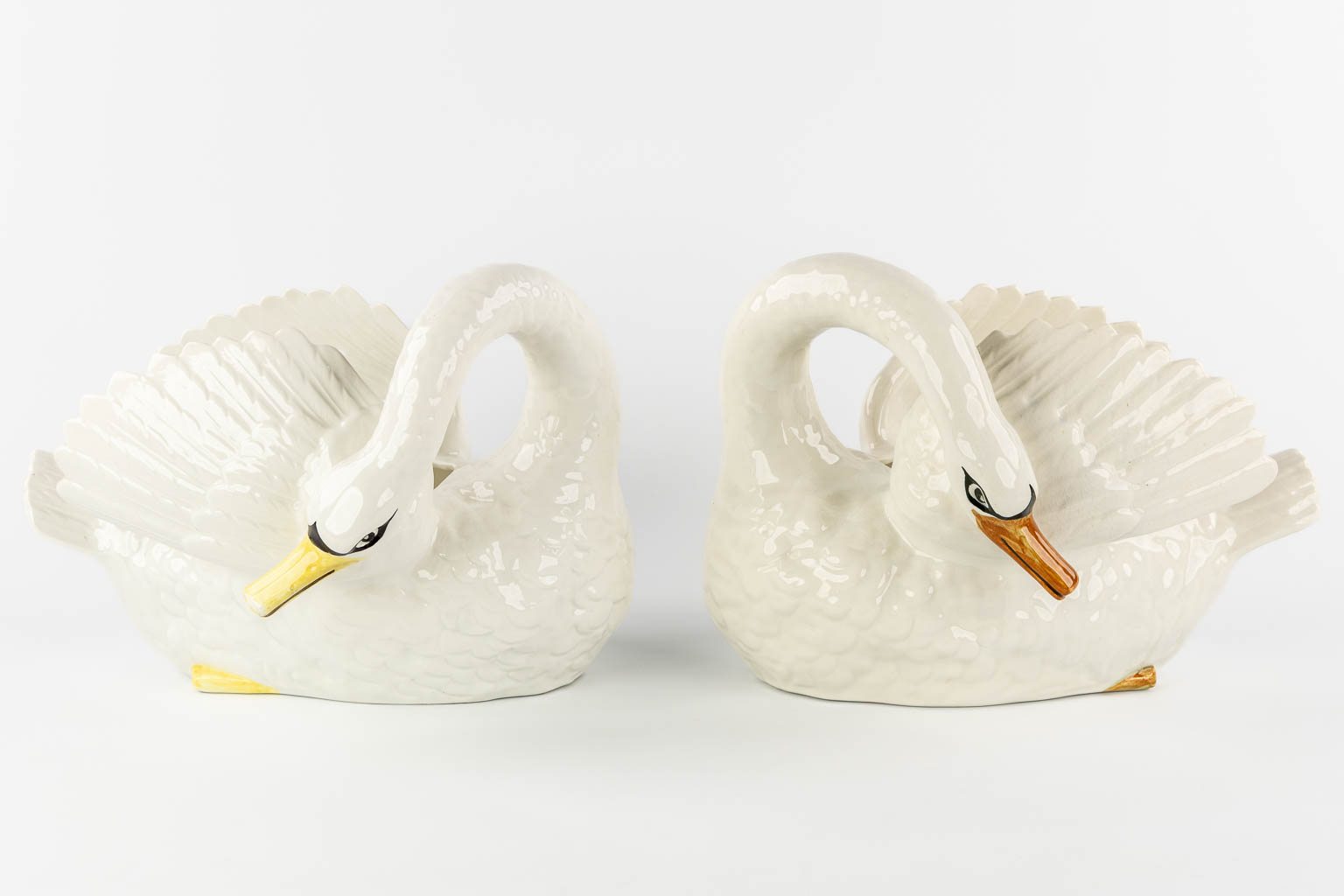 Nimy, a pair of figurative cache-pots, Swans.