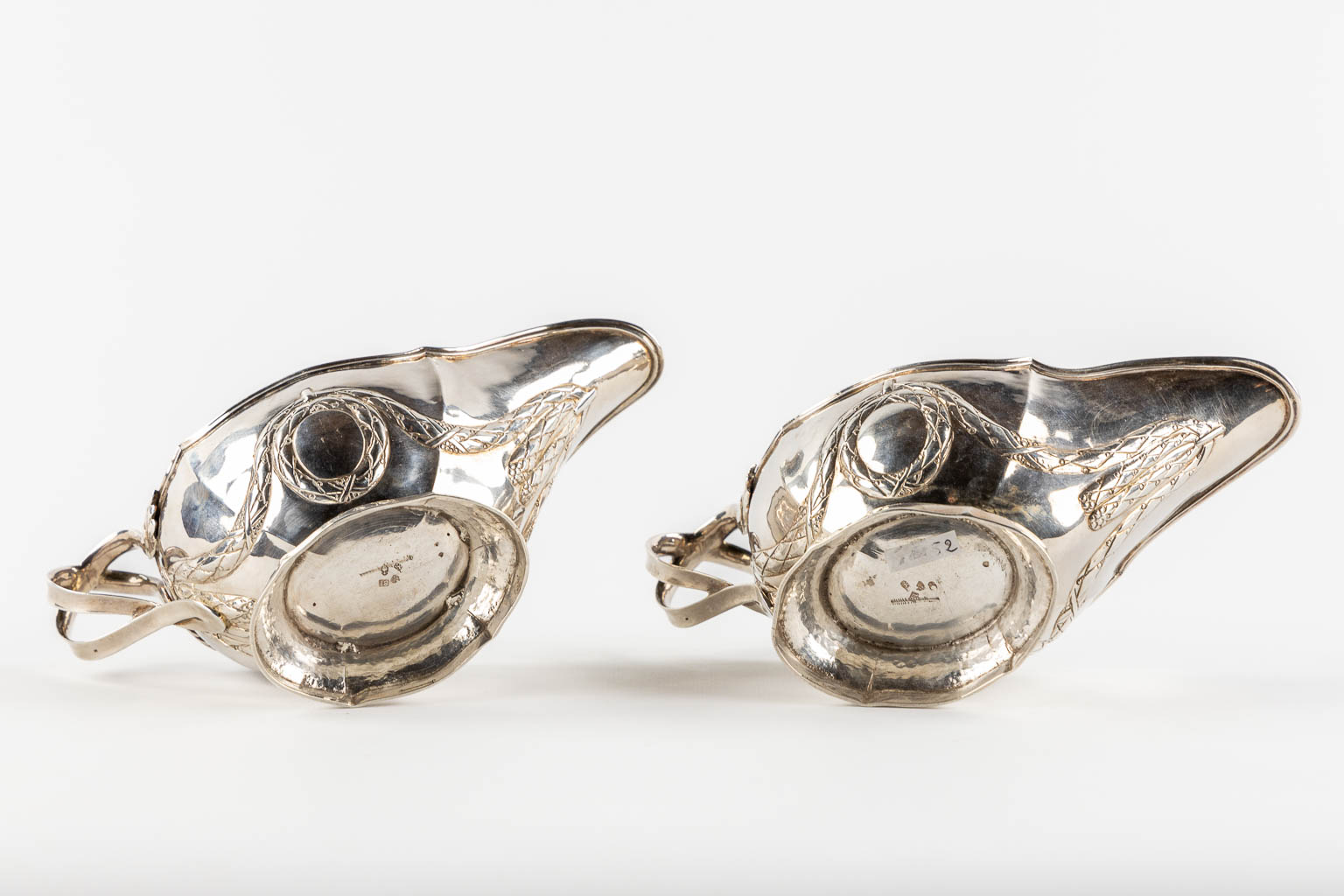 A pair of saucers, silver, Louis XVI. 