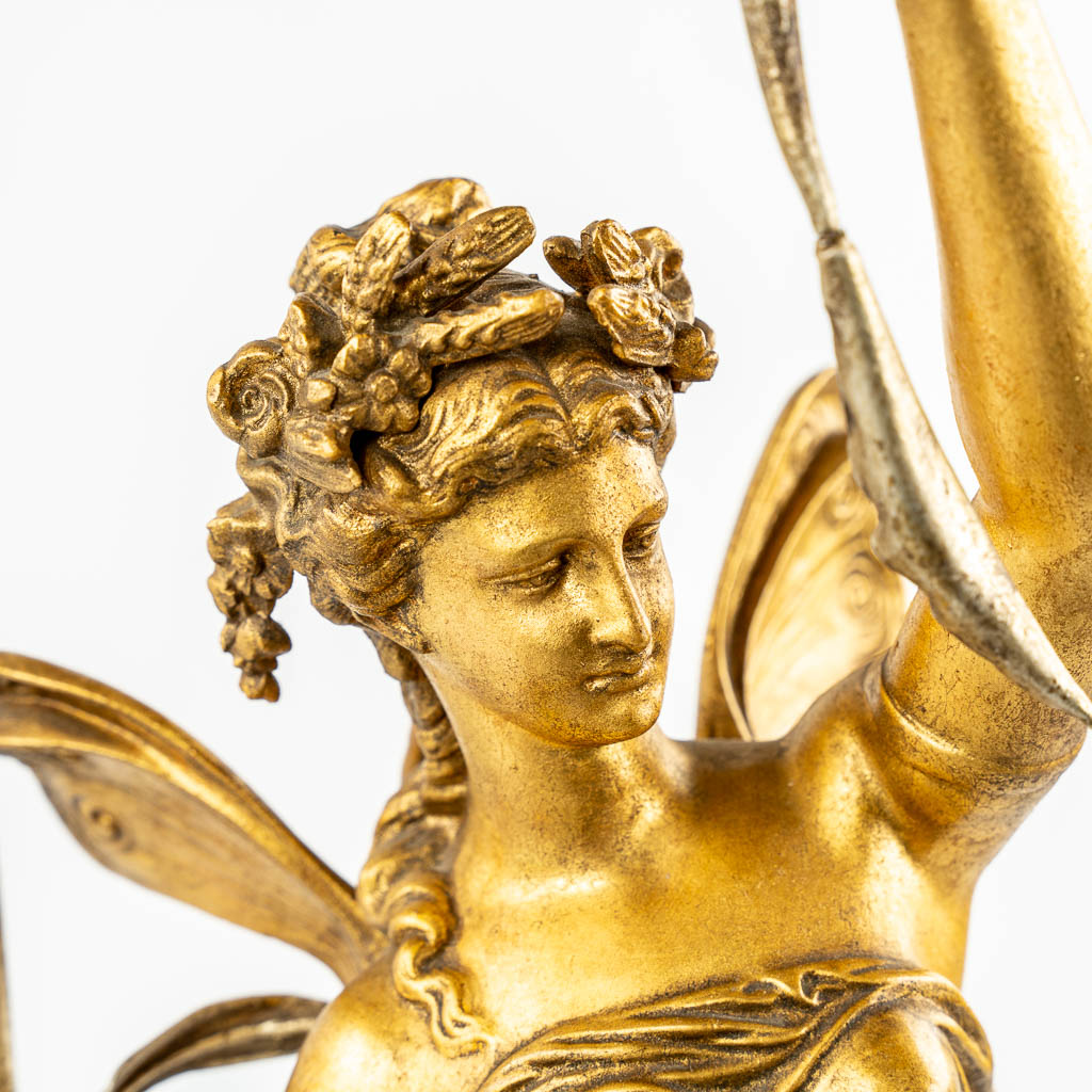 A table lamp with an Angel or Nimph, gilt spelter. (c.1900). 