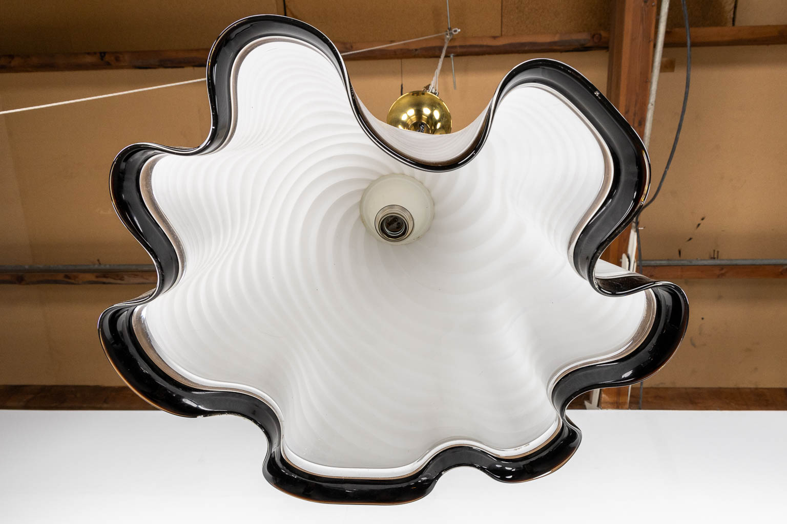 A large Venetian ceiling lamp in a 