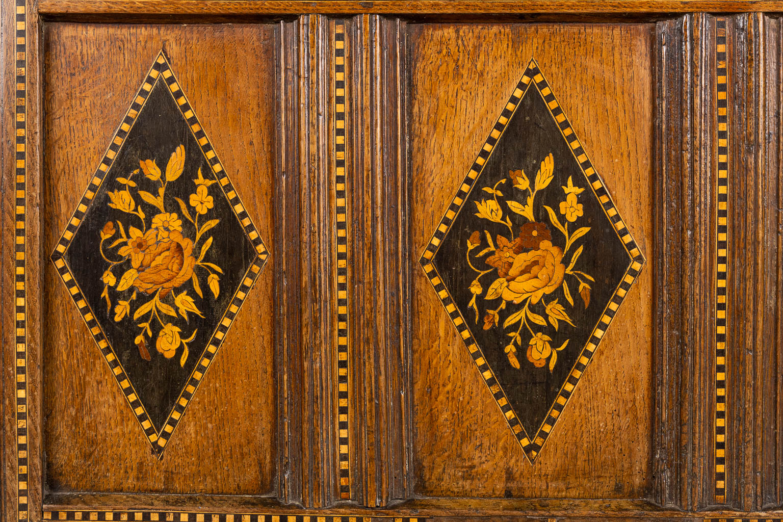 An antique chest with floral marquetry inlay, 18th C. (L:53 x W:124 x H:64 cm)