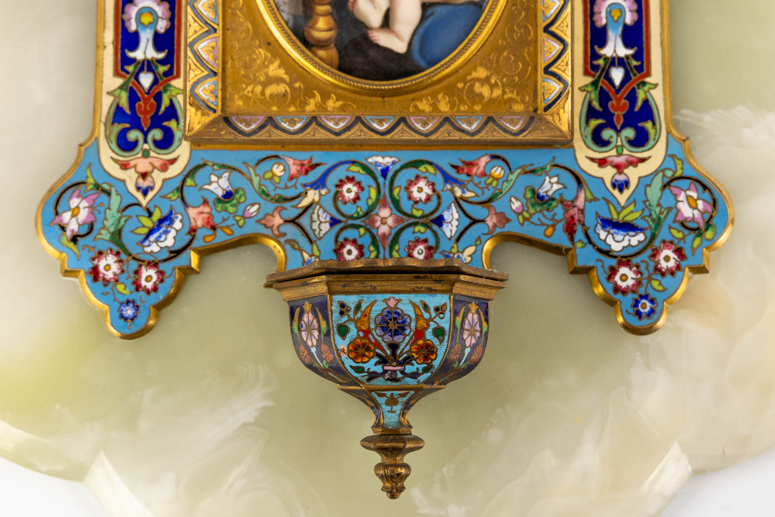 A Holy Water Font, bronze on an alabaster and finished with Cloisonné and an enamel plaque 