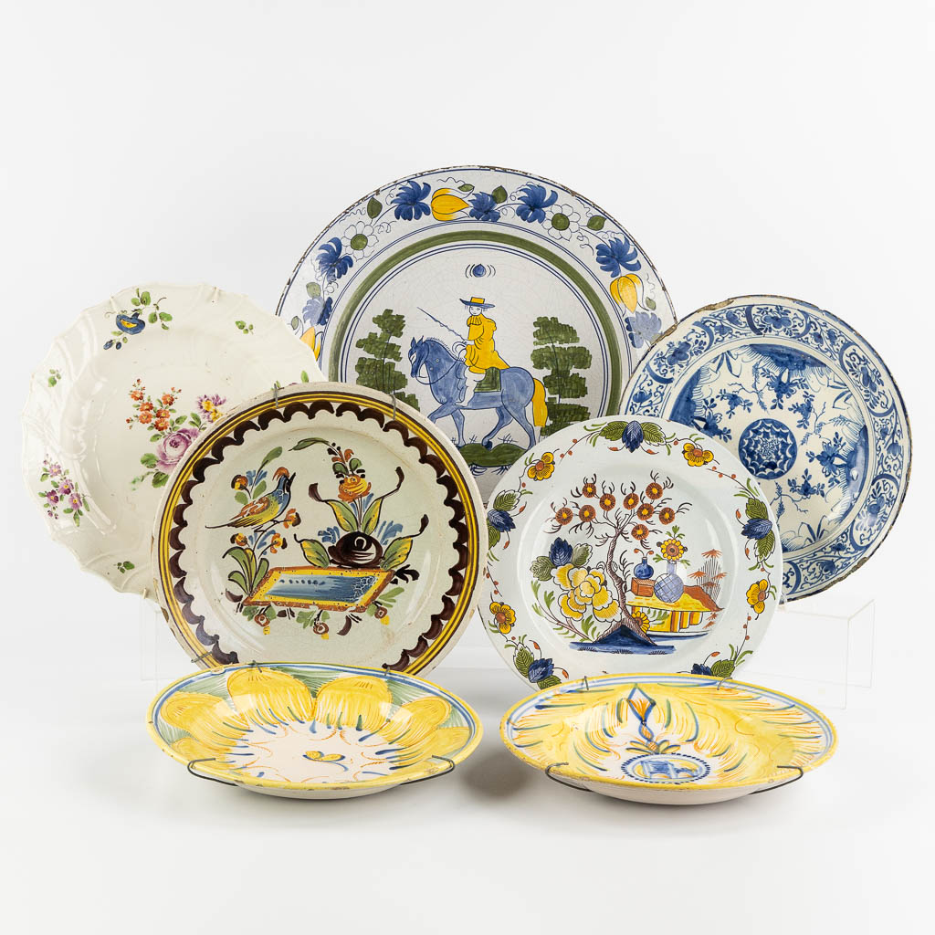 Seven Faience plates, France, 18th and 19th C. (D:42 cm)