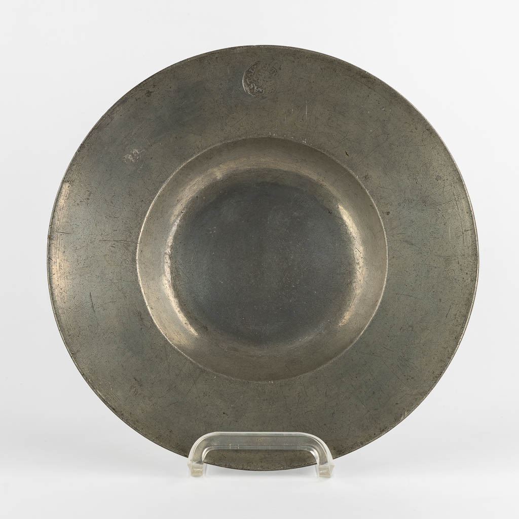 A Tin/Peweter plate in the shape of a Cardinal hat, Southern France, Circa 1625-1650. (D:31 cm)