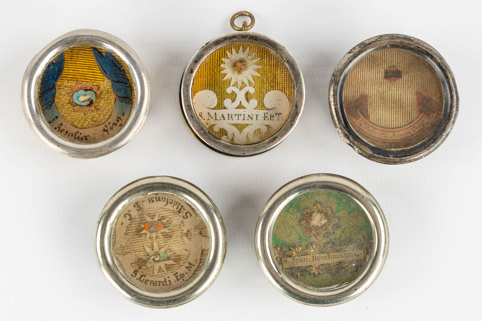 Five sealed theca with relics for saints. 