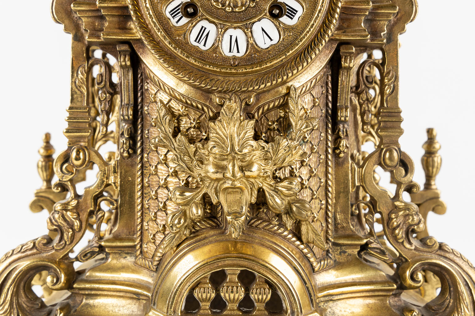 A large three-piece mantle garniture clock, polished bronze. Circa 1970.