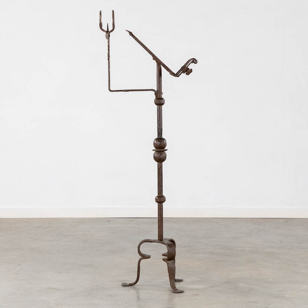 A wrought-iron lectern. 19th C. (W:40 x H:136 cm)