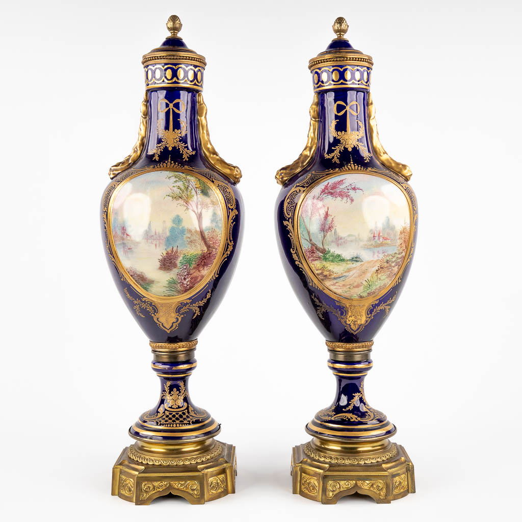 A pair of hand-painted and cobalt blue vases, J. Tiélès, Paris, France. (H:67 x D:20 cm)