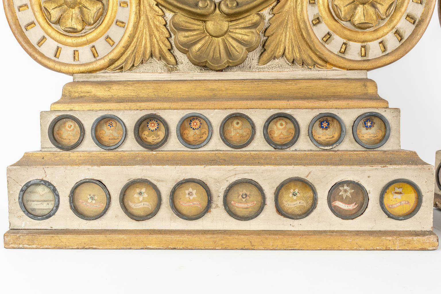 A pair of large reliquary cabinets with 95 theca, of which 65 have documents. Neoclassical style, 19th C.