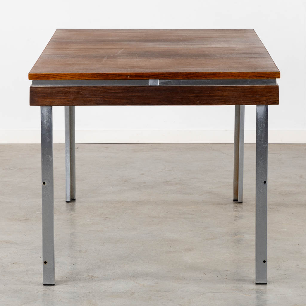 A mid-century table, veneer and chomed metal. By Roger De Winter. (L:84 x W:161 x H:74 cm)