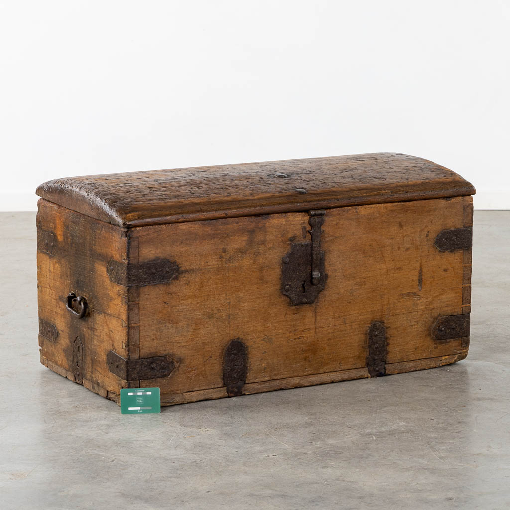 An antique chest with wrought iron hardware, circa 1700. (L:52 x W:93 x H:48 cm)