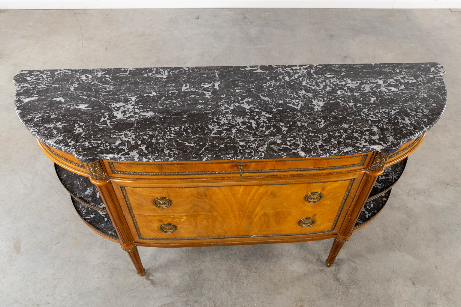 A console table with three drawers, marble top. Louis XVI style. (L:43 x W:154 x H:92 cm)