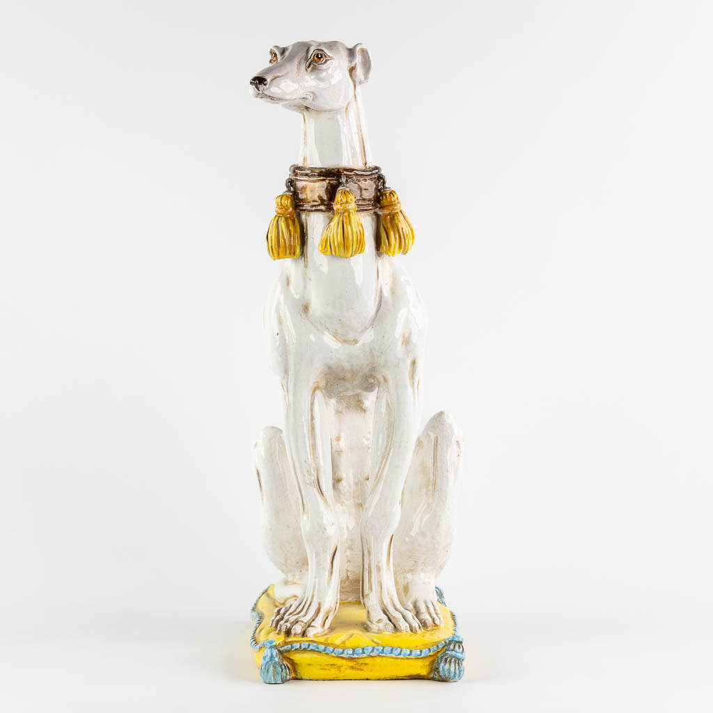 Figurine of a Greyhound, glazed terracotta. Italy, 20th C. (L:24 x W:42 x H:67 cm)