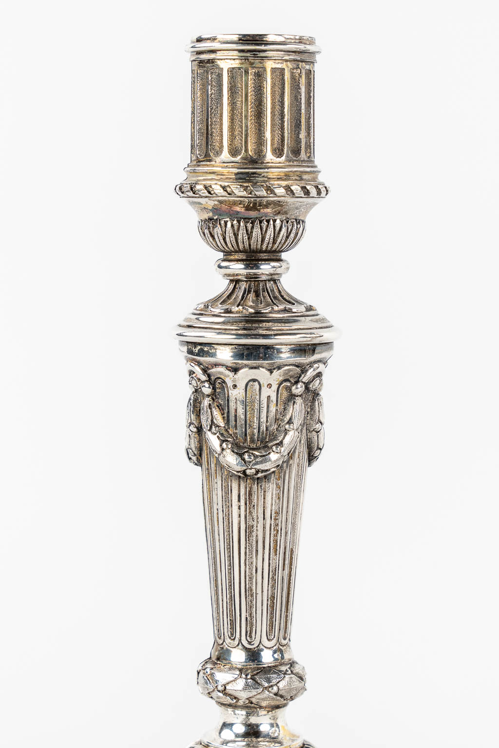 Christofle 'Duperier' a large candelabra, added are a pair of Candlesticks in Louis XVI style.