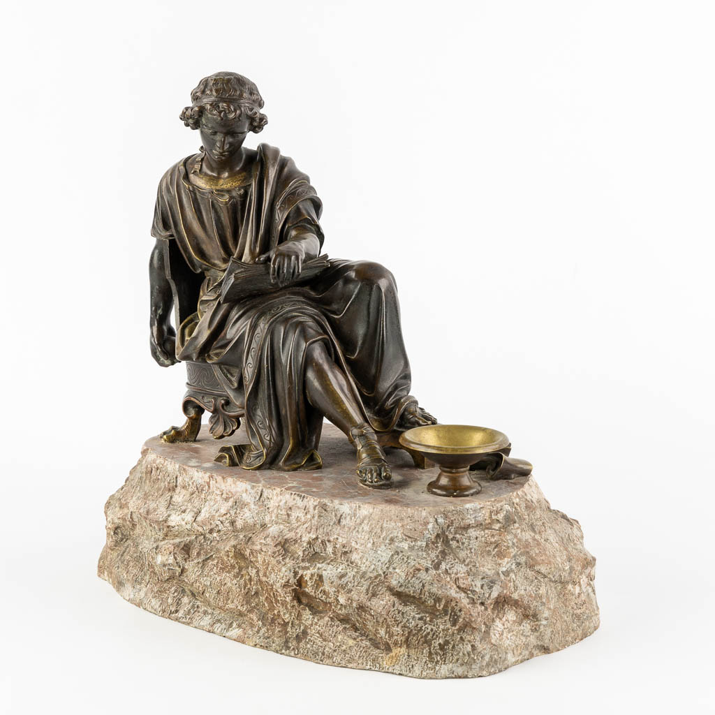 The Reading Roman, patinated bronze. 19th C. (L:23 x W:38 x H:34 cm)