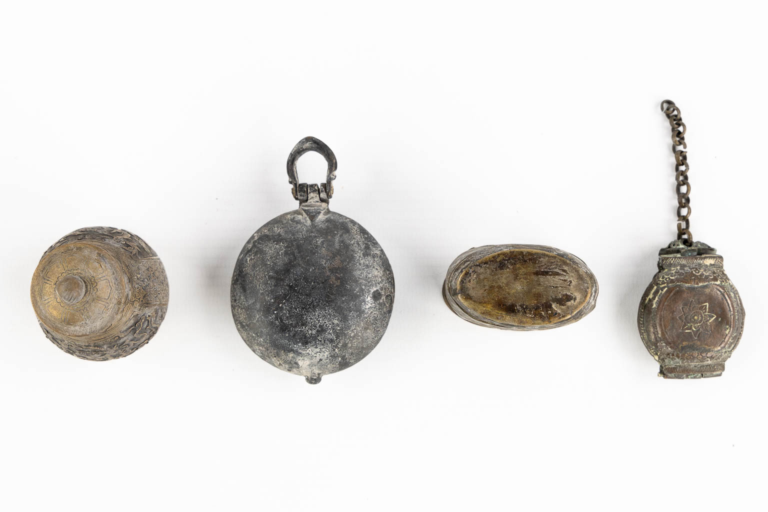 Fourteen Islamic and Indian Amulet or Trinklet boxes, Silver and silver-plate. 19th/20th C. (L:9,5 x W:16,5 x H:2,5 cm)