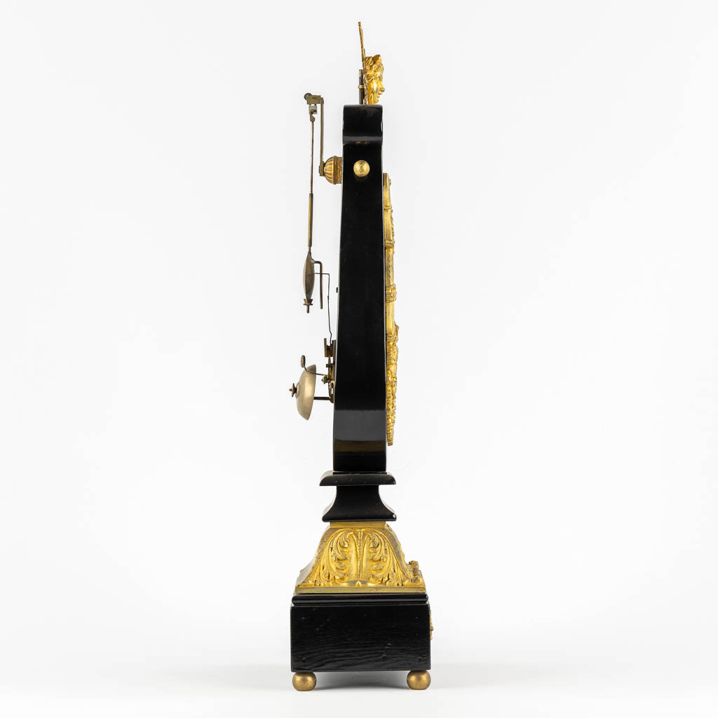 A Lyre mantle clock, gilt bronze and marble. 19th C. (L:13 x W:22 x H:61 cm)