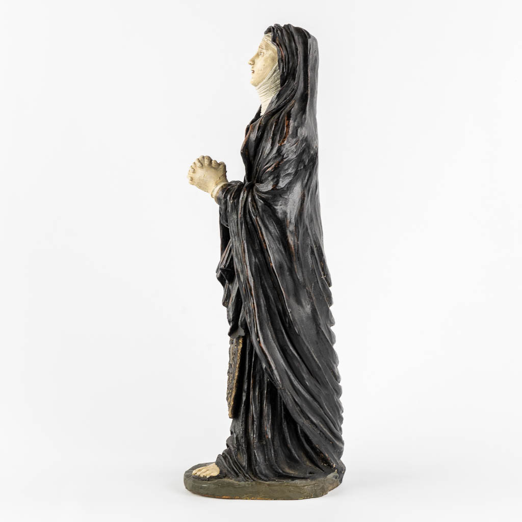 Saint Genoveva of Paris, polychrome terracotta with glass eyes. (W:17 x H:54 cm)