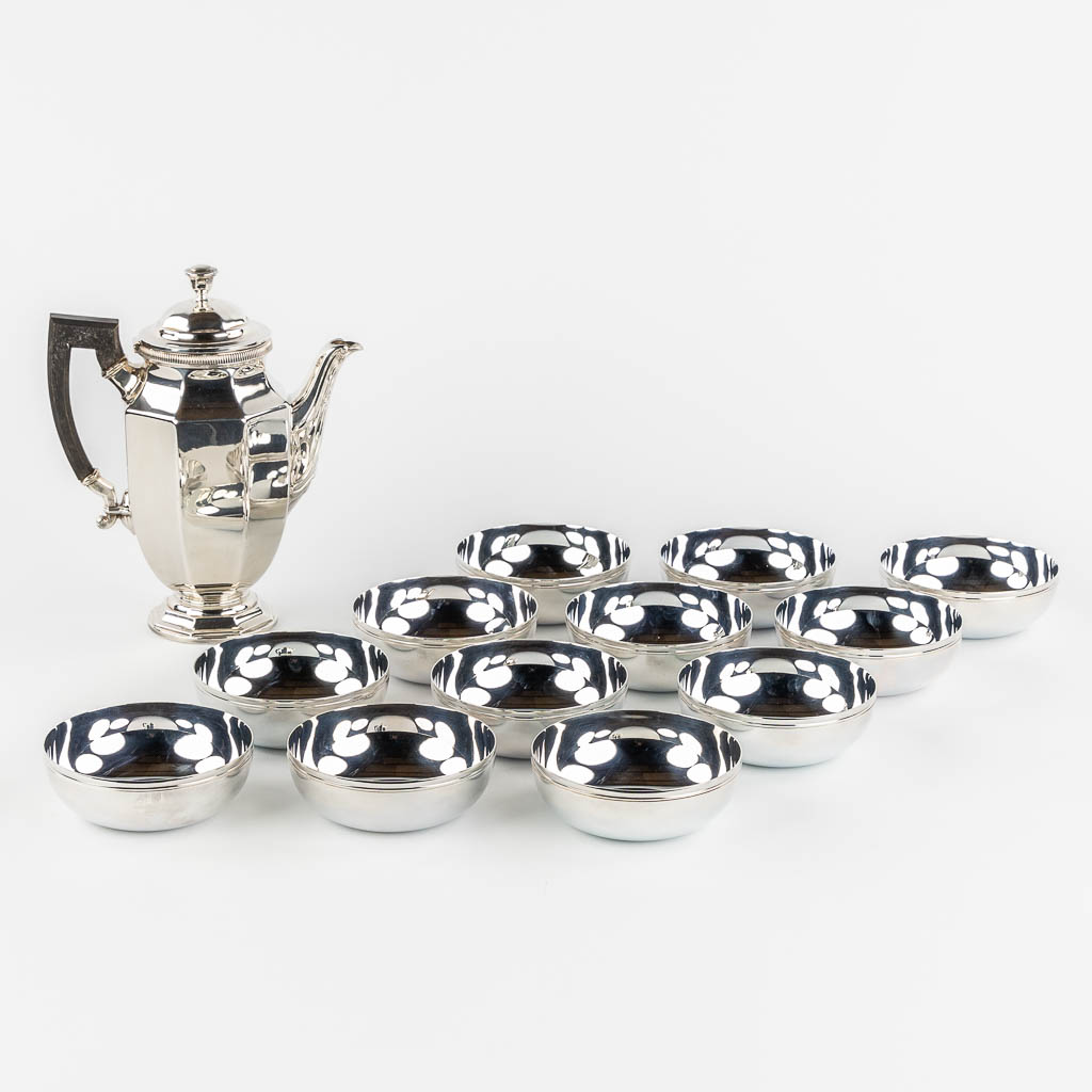 Christofle, a coffee pot and 12 bowls. Silver-plated metal.