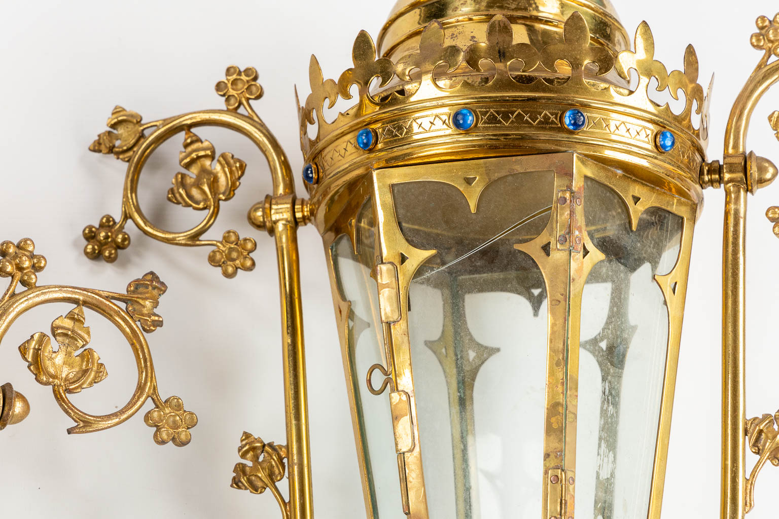 Three Processional lanterns, brass finished with cabochons, Gothic Revival. (W:48 x H:82 cm)